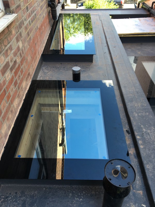Multiple flat roof skylights on extension in Herne Hill